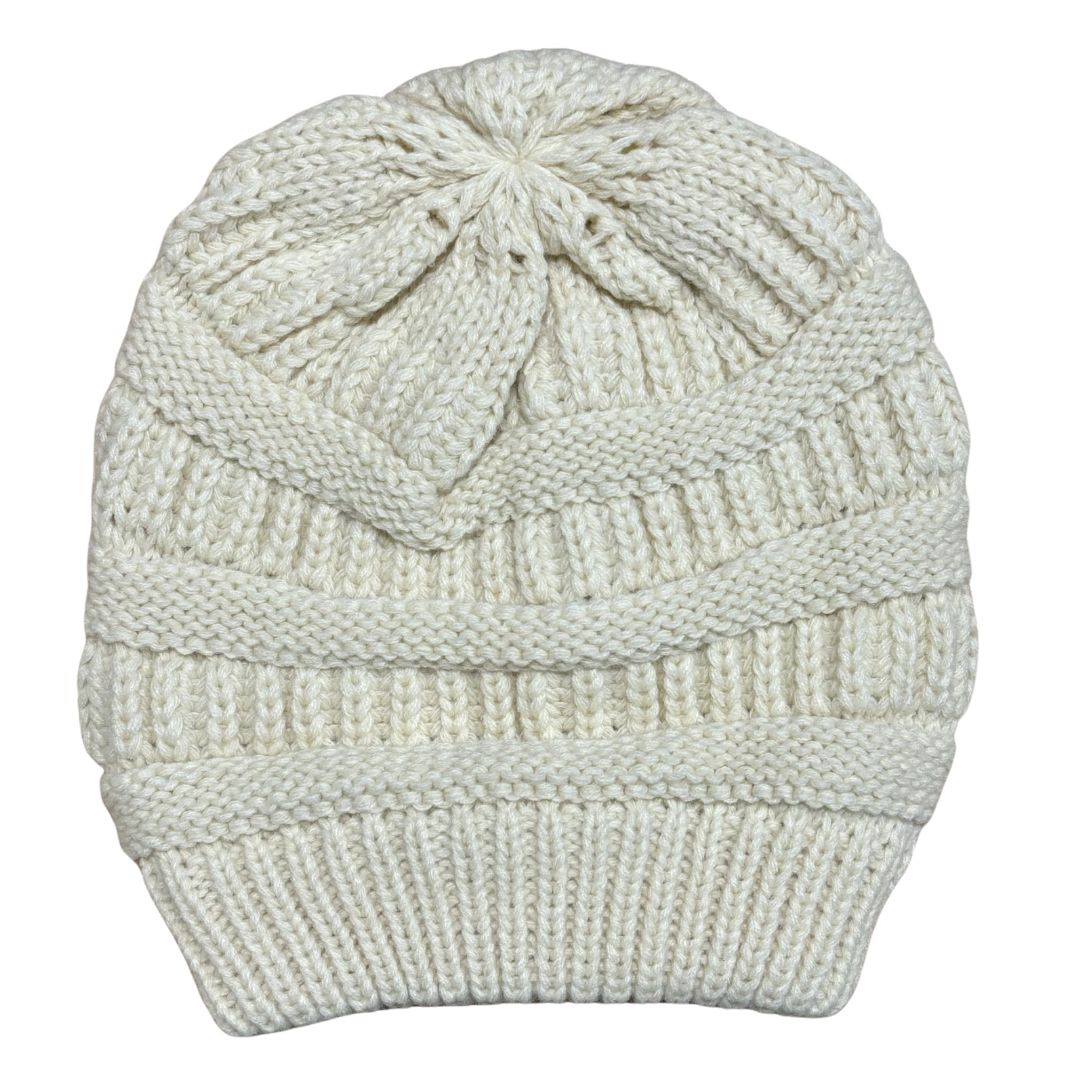Beige Knitted beanie on a white background