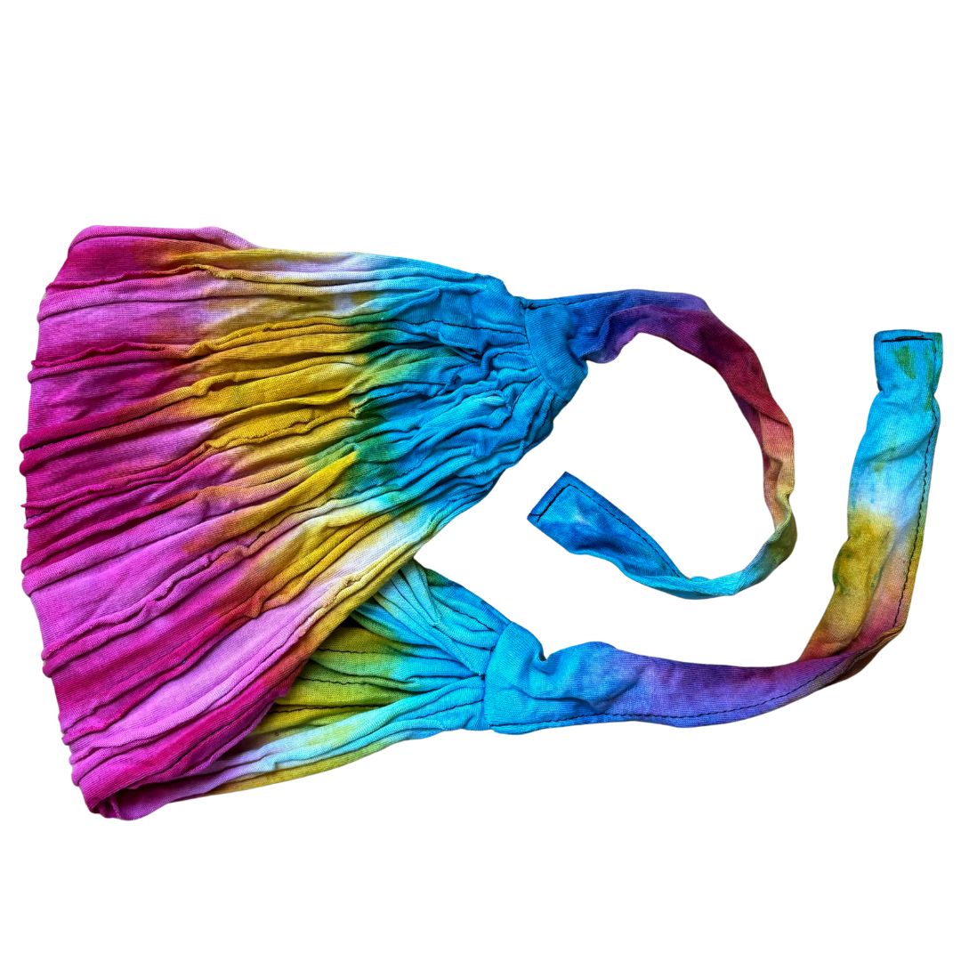 Rainbow tie-up headband on a white background