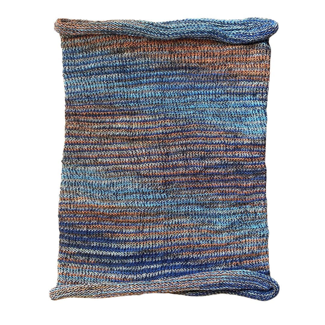 Blue and orange cotton hair wrap on a white background.