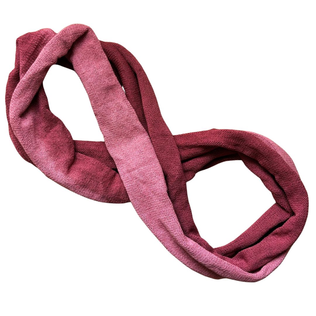 Red and pink cotton double loop dread wrap headband on a white background