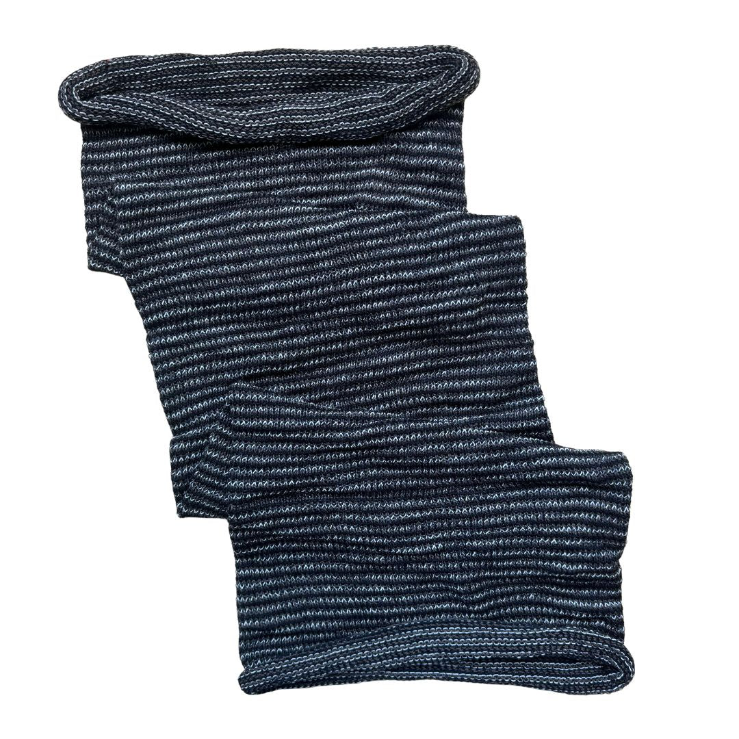 Black and white large cotton dreadlock sock on a white background.