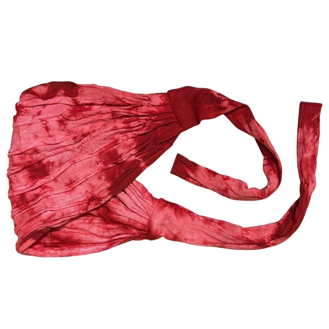 Red cotton headscarf with a long tail on a white background