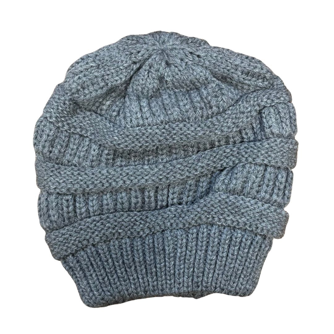 Grey knitted beanie on a white background