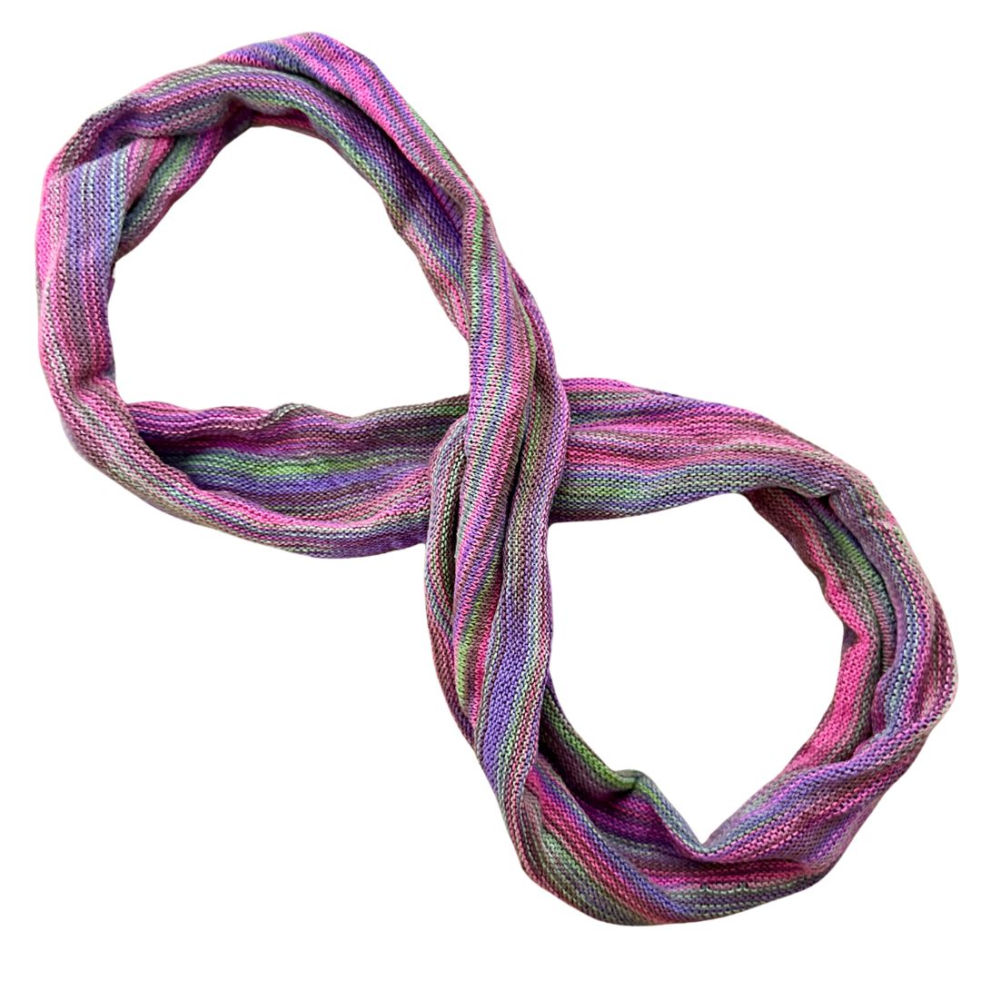 pink purple green cotton double loop dread wrap headband on a white background.