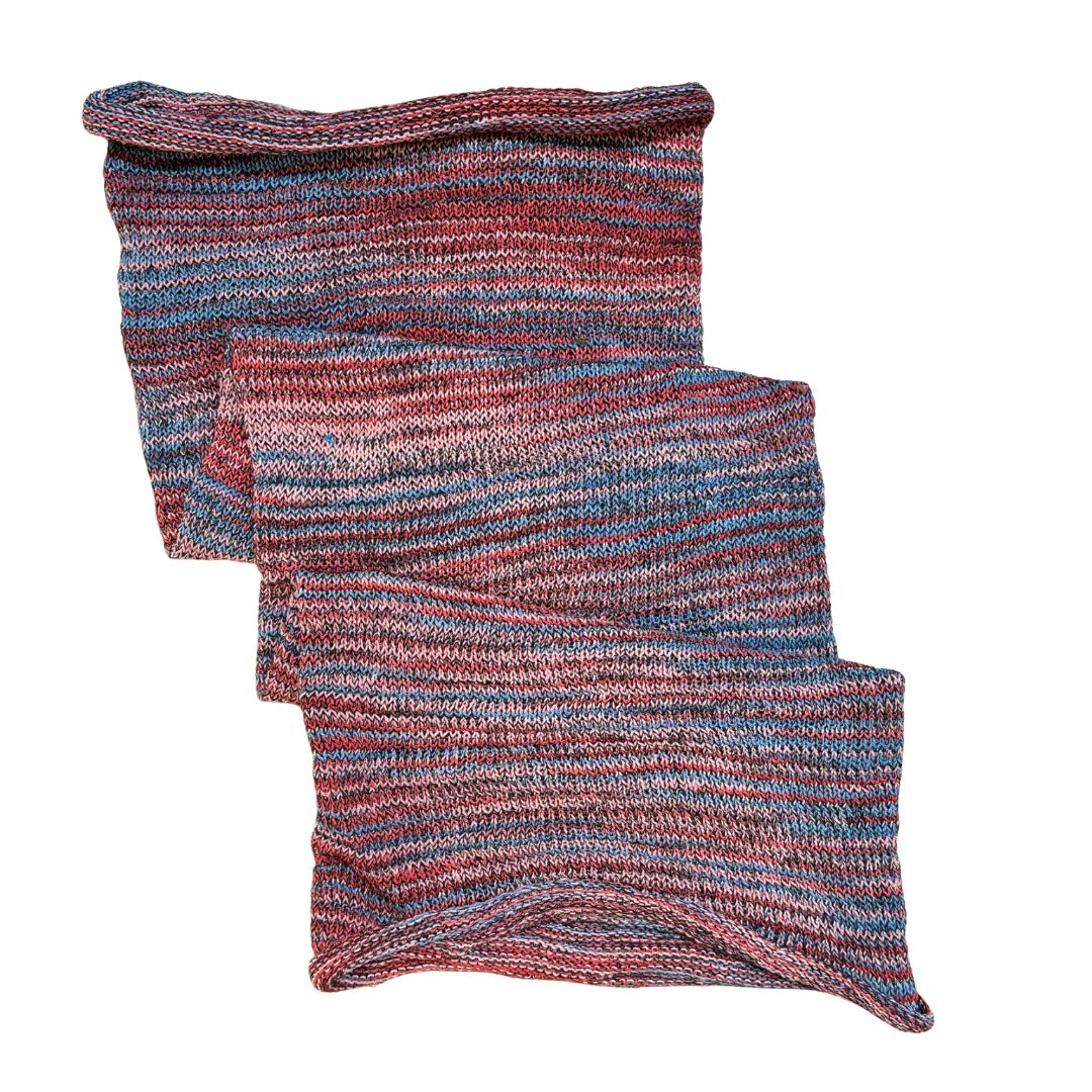 Blue red pink large cotton dreadlock sock on a white background.