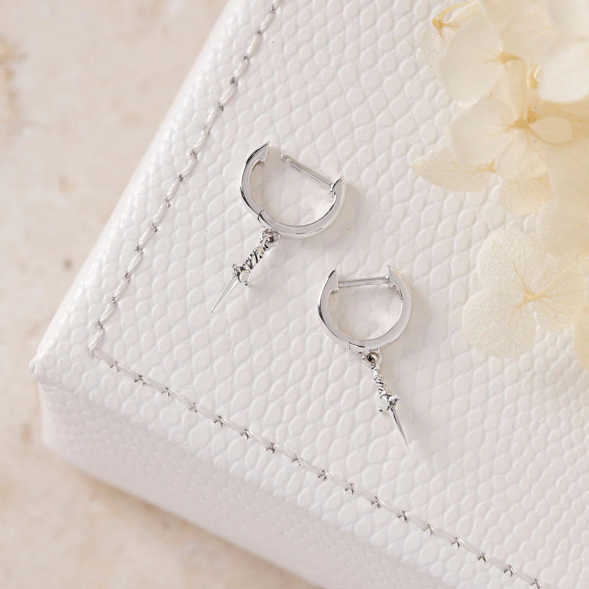 Sterling Silver Cosmic Dagger Huggies