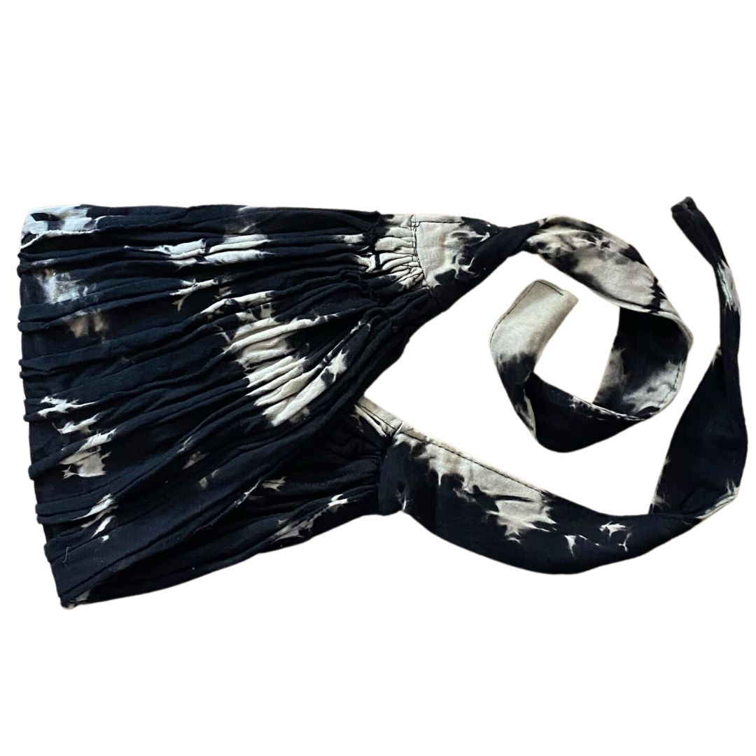 Black and white tie-up headband on a white background