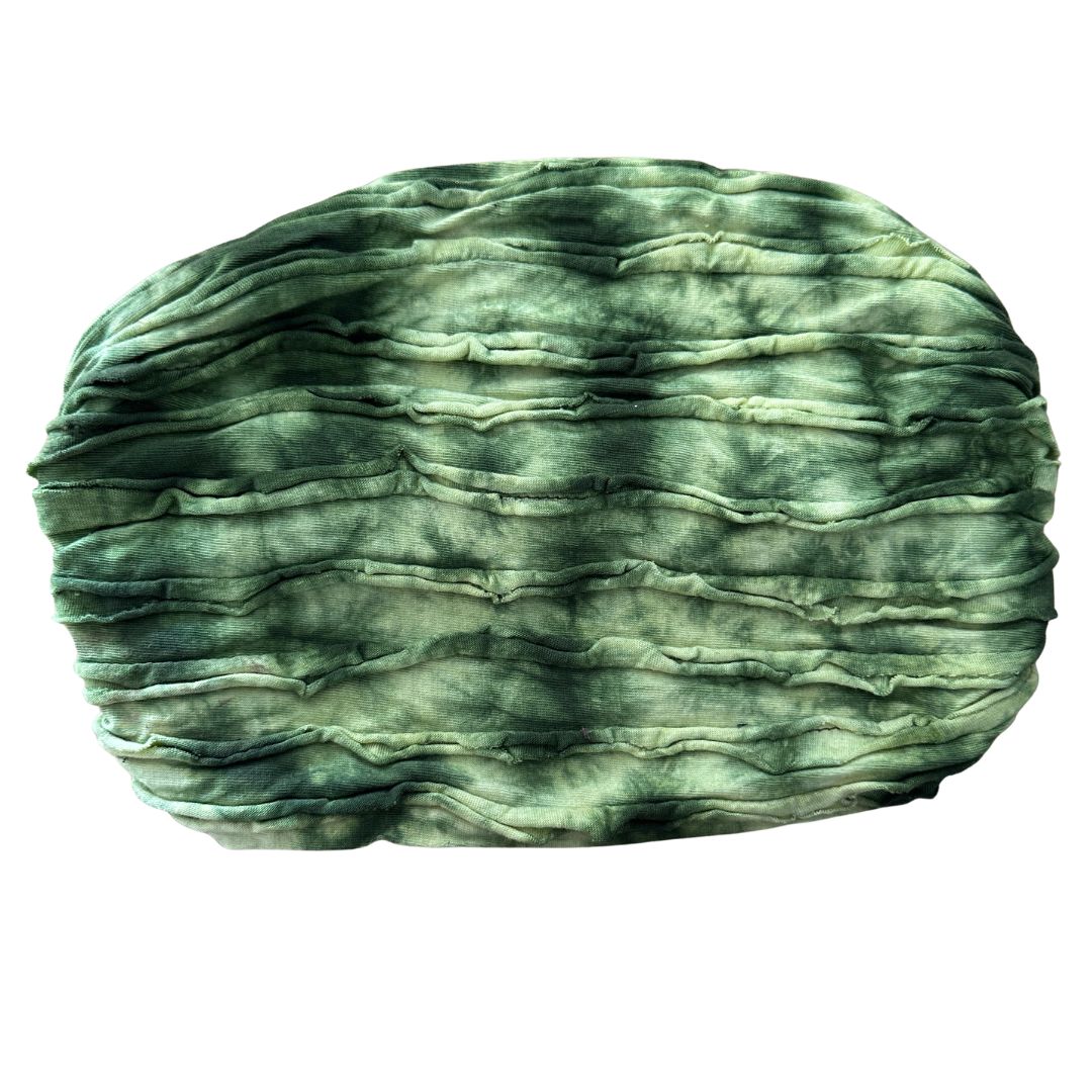 Green textured headband on a white background