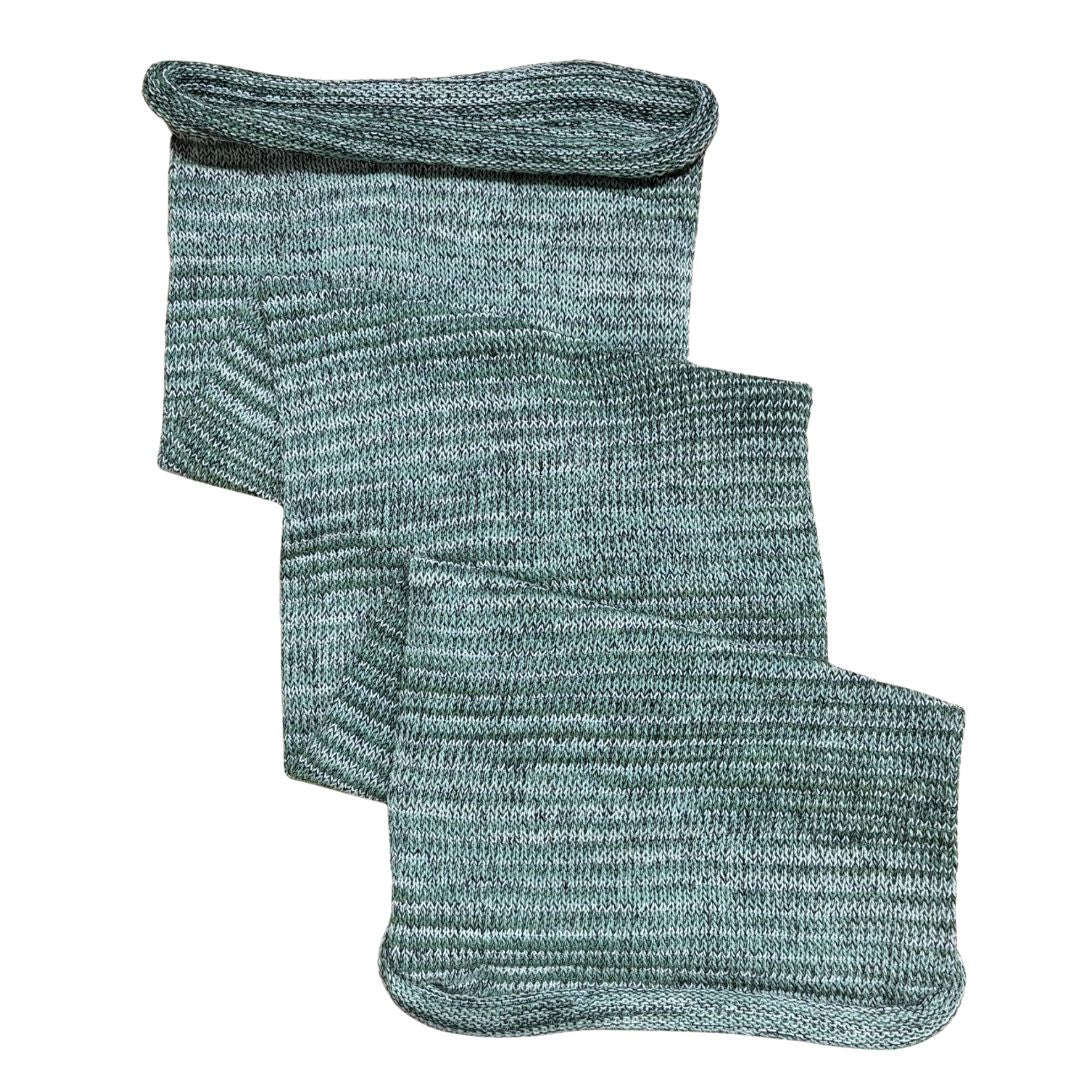 Light green and white large cotton dreadlock sock on a white background.