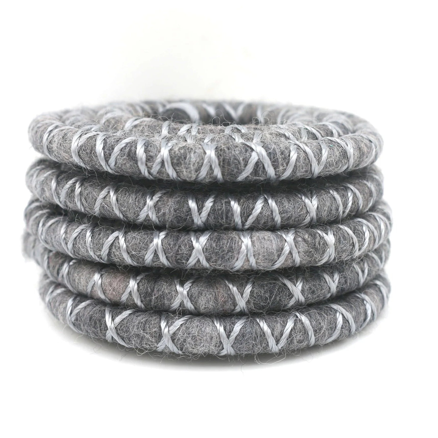 Greay dreadlock spiralock hair tie on a white background