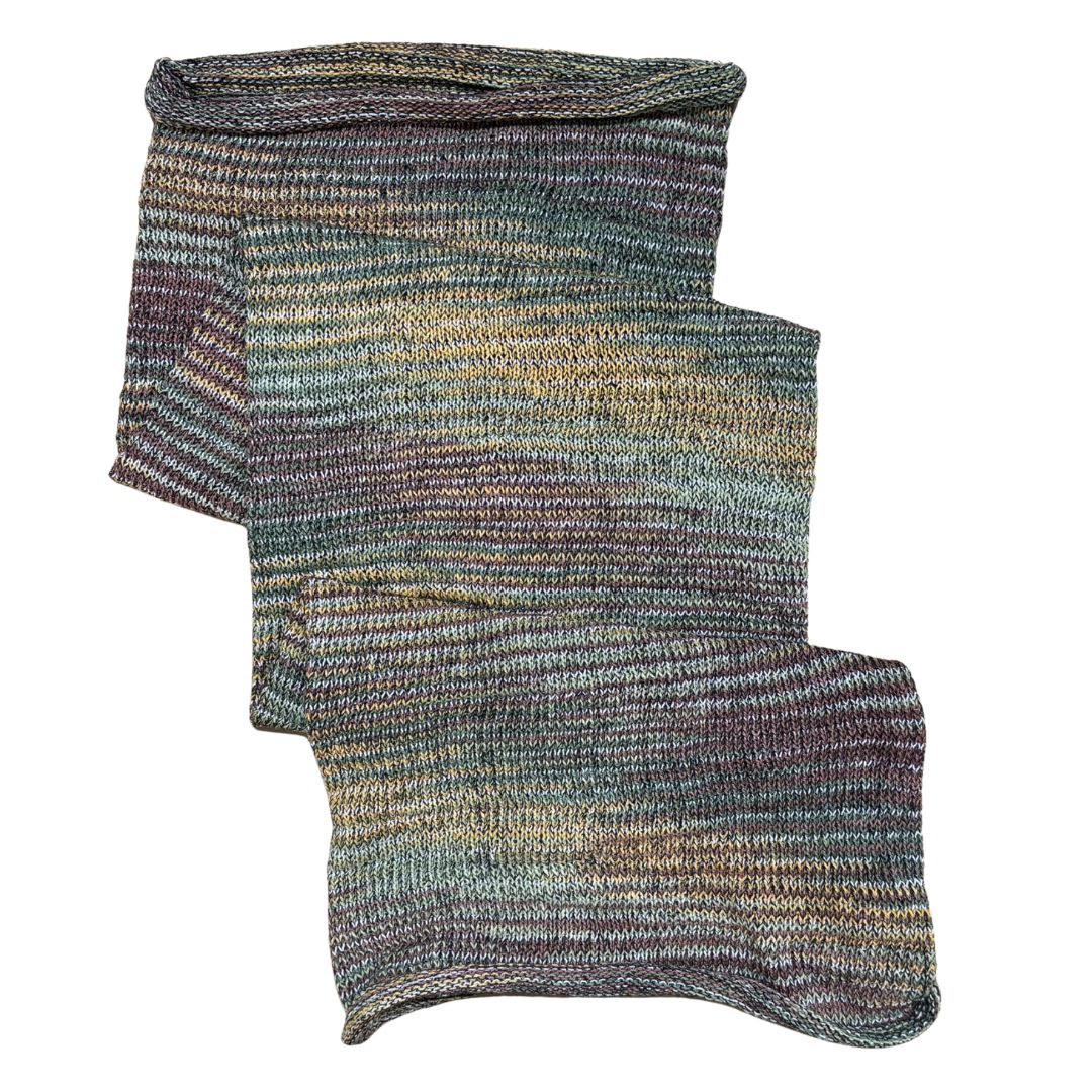 Yellow green brown large cotton dreadlock sock on a white background.