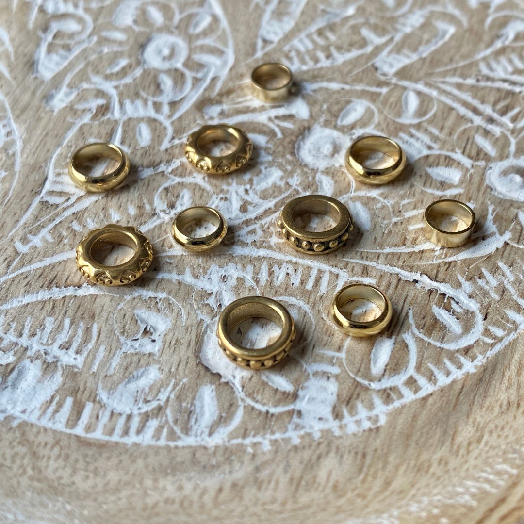 Golden stainless steel dread rings set of 10