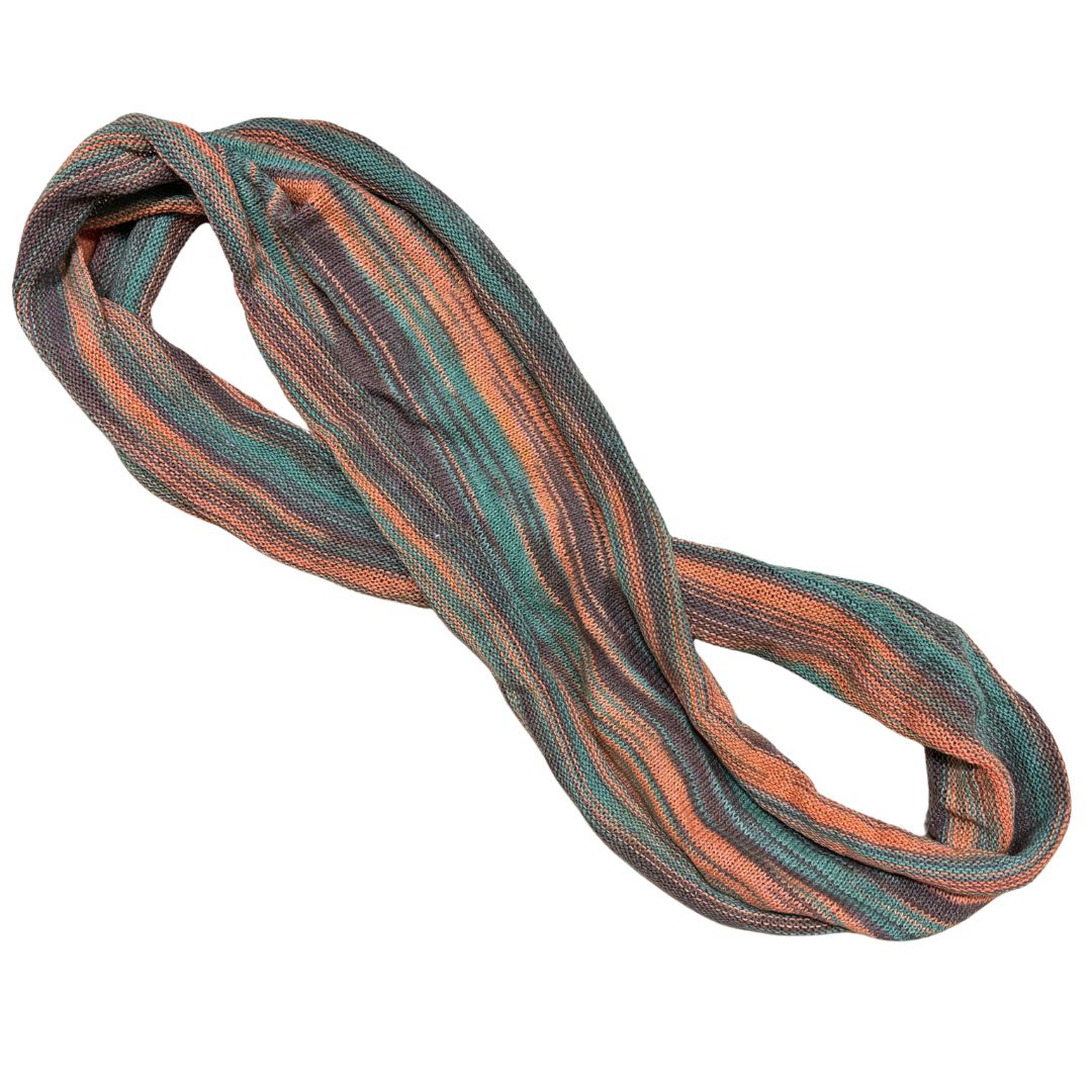 Orange brown and green cotton double loop dread wrap headband on a white background.