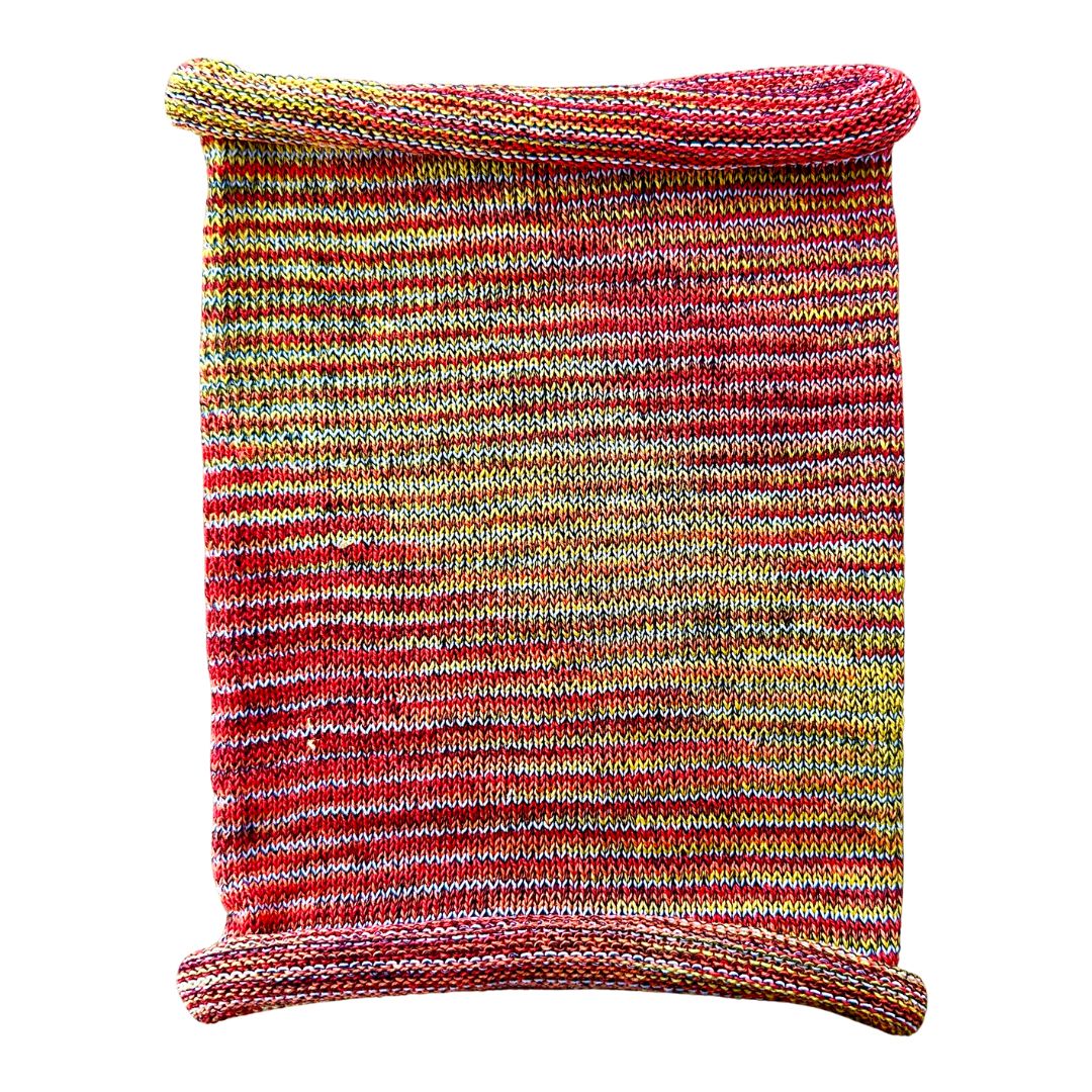 Red and yellow cotton hair wrap on a white background.