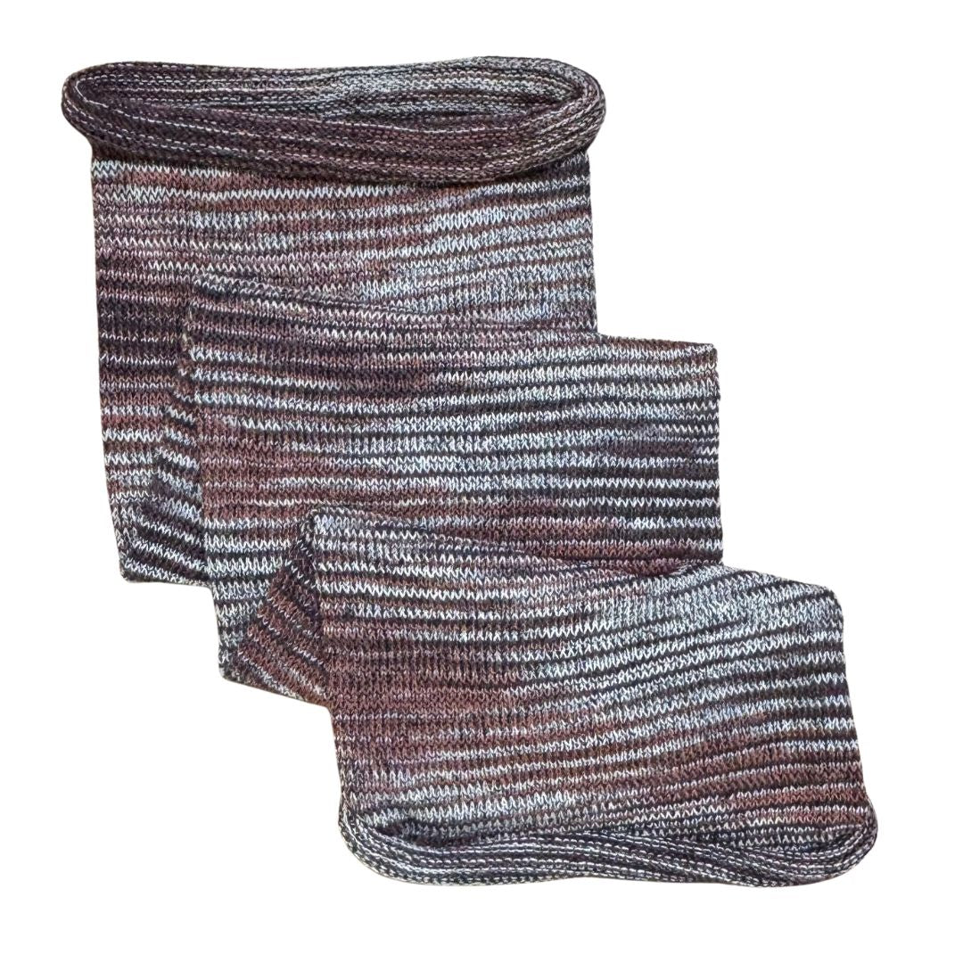 Brown and white large cotton dreadlock sock on a white background.
