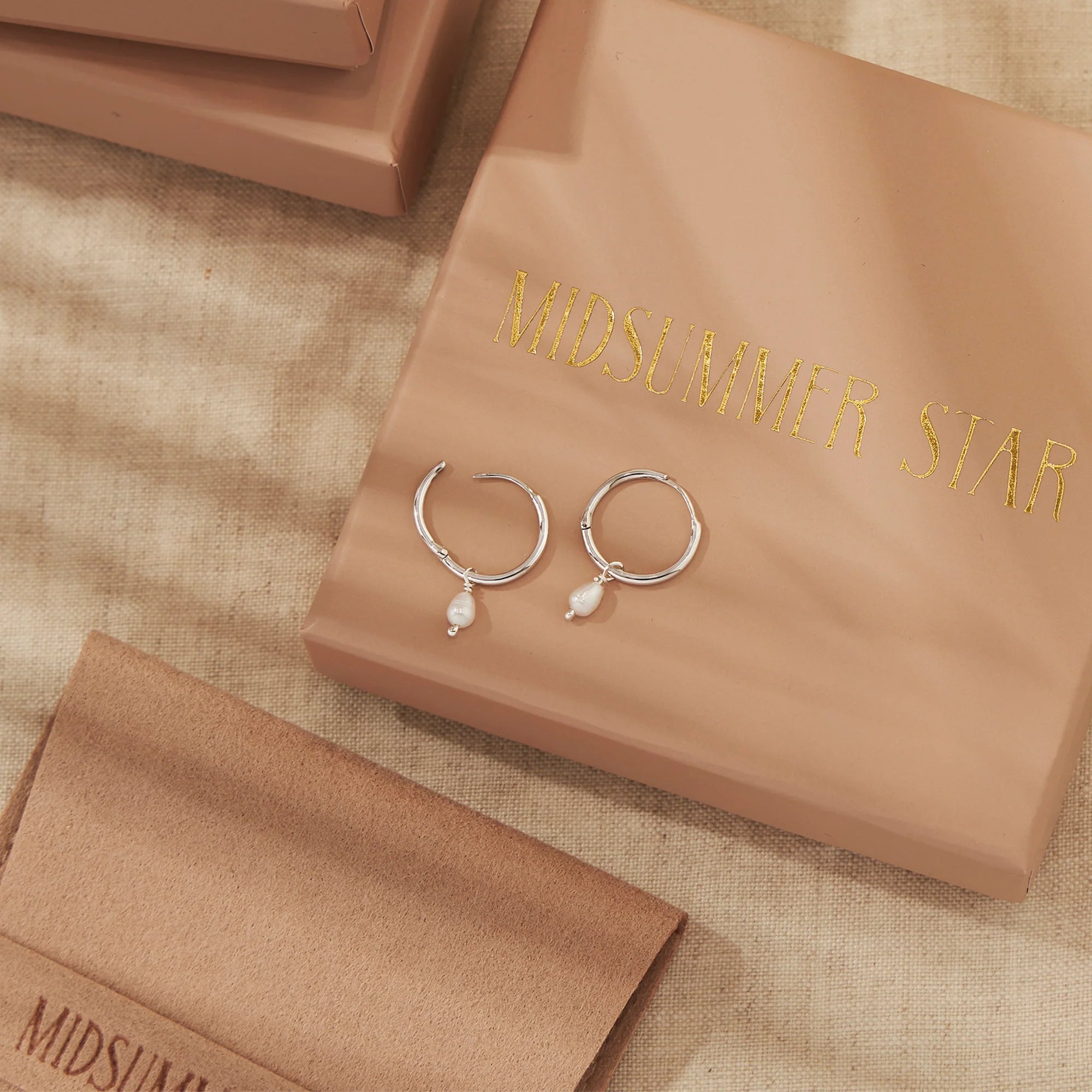 Sterling Silver Dainty Pearl Huggies