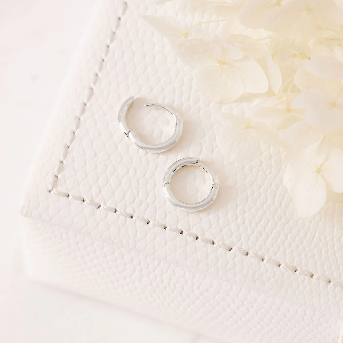 Sterling Silver Delicate Round Huggies