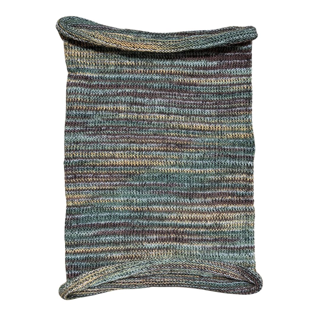 Brown green and yellow cotton hair wrap on a white background.