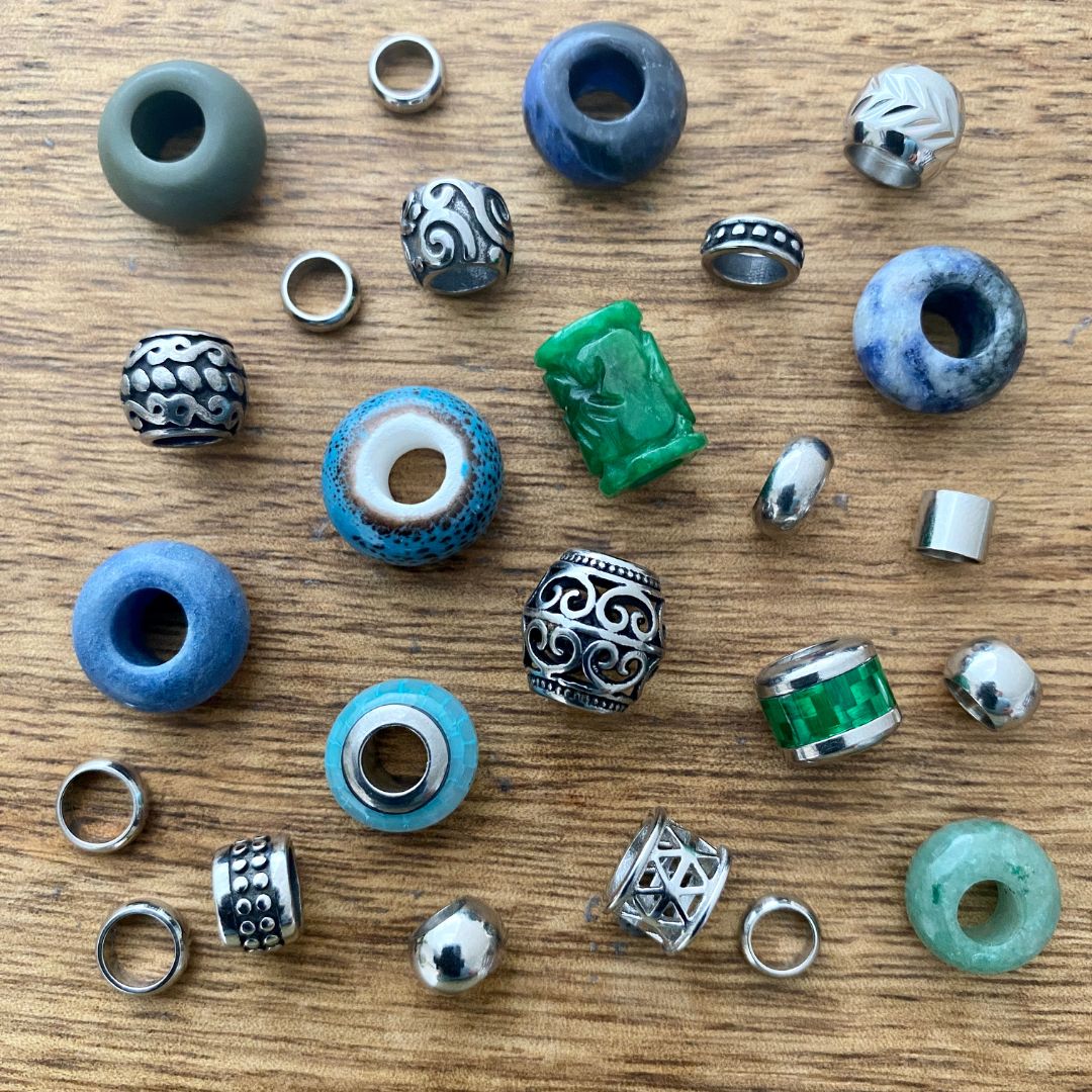 Blue and Green Dreadlock Beads Mix on a wooden board - Mountain Dreads